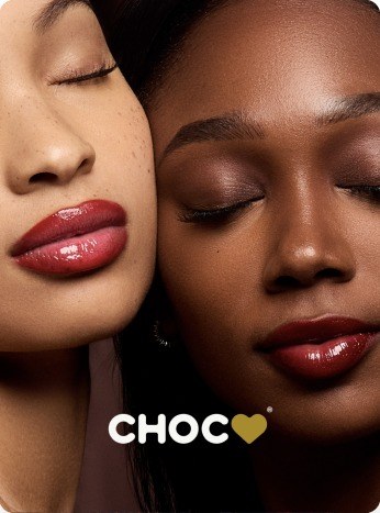 Two models cheek to cheek wearing CHOC lip gloss