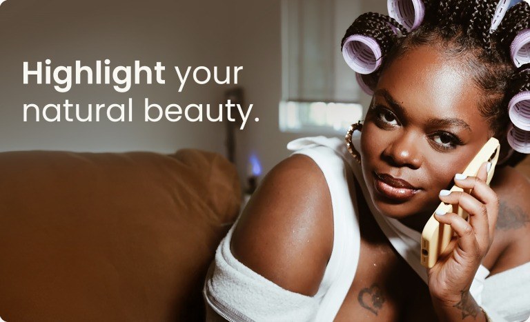 Two models embracing, 'Highlight your natural beauty' campaign panel