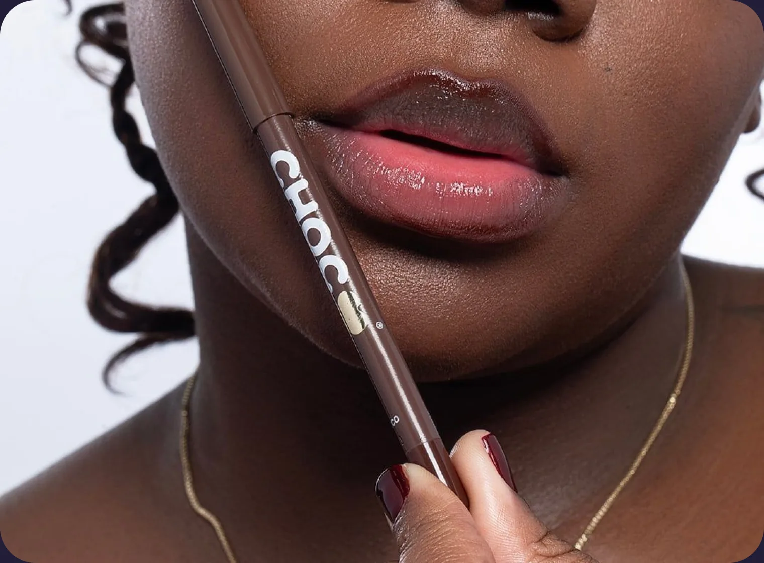 A model applying a CHOC lip liner